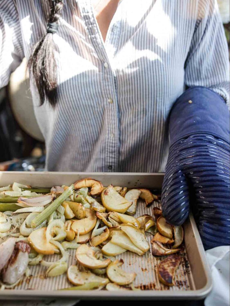 tray of roasted vegetables and fruit